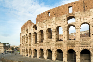 Obraz premium Colosseum, Rome, Italy. Colosseum, originally known as the Flavian Amphitheater, commissioned in A.D. 70-72 by Emperor Vespasian, is the largest amphitheater ever built, made of concrete and sand.