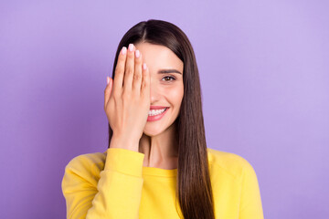 Portrait of attractive cheerful long-haired girl closing half face health care isolated over violet...