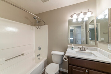 Fototapeta na wymiar Small bathroom interior with vanity sink and mirror cabinet