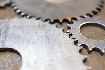 large and small gears interact, some of the mechanisms