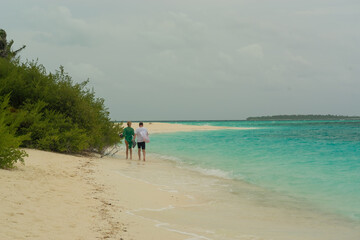 the sandy coast of a coral island in the Indian Ocean