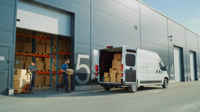 Outside of Logistics Retailer Warehouse With Female Manager Using Tablet Computer, Worker Loading Delivery Truck with Cardboard Boxes. Online Orders, Purchases, E-Commerce Goods, Merchandise