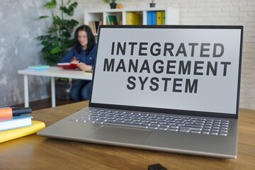 Laptop with integrated management system in the office.