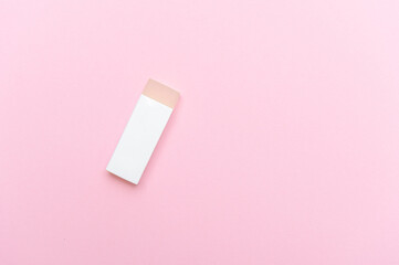Eraser for cleaning sneakers on pink color background