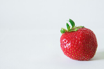 Close-up of a strawberry on a white background