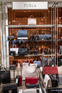DUSSELDORF, GERMANY - 19 OCTOBER, 2019: Interior shot of Furla store in Breuninger luxury shopping mall at Schadowplatz in city center Dusseldorf, Germany