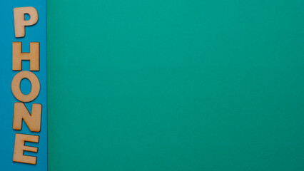 wooden letters with the word "phone" written on bluish backgrounds