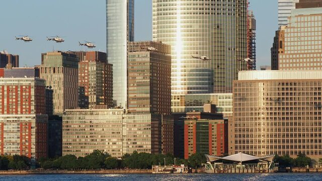 Six helicopter flying around the Manhattan city