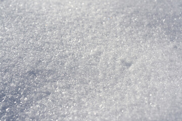 Pure white snow texture. Background from snowflakes top view.
