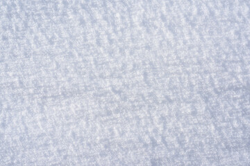 Pure white snow texture. Background from snowflakes top view.