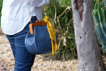Close Up on Blue Wicker Purse