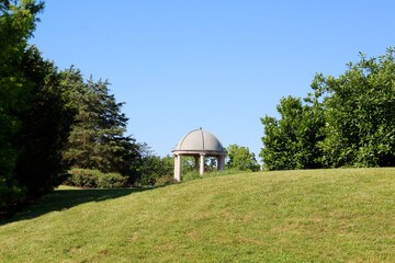 The top of the dome cement gazebo in the park.