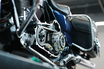 Blue motorcycle in repair sevice closeup background