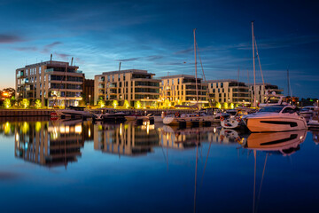 Fototapeta na wymiar Yacht marina in Gdynia with modern architecture at dusk. Poland