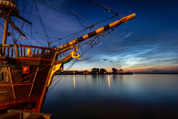Fototapeta premium Night scenery in Gdynia with noctilucent clouds over the harbor. Poland