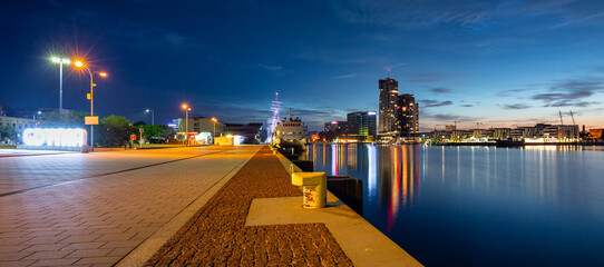 Harbor in Gdynia with modern architecture at night. Poland