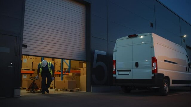 Logistics Warehouse Two Happy Diverse Workers Talk, Joke while Loading Delivery Truck with Cardboard Boxes, Online Orders, Purchases, E-Commerce Goods, Food or Medicine Products. Evening Wide Pan