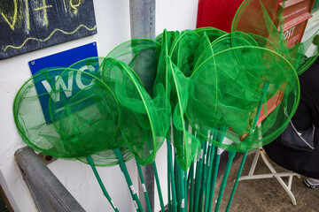 Tornby, Denmark Fishing nets for sale outsode a store.