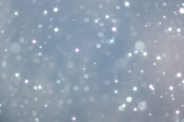 blue snowfall bokeh background, abstract snowflake background on blurred abstract blue