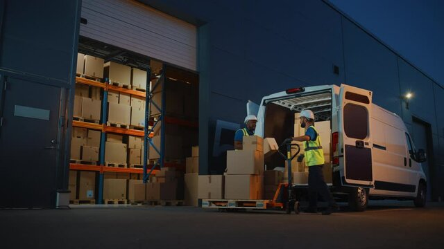 Outside of Logistics Distributions Warehouse: Two Workers Load Delivery Truck with Cardboard Boxes, Drive Off to Deliver Online Orders, Food and Medicine Supply, E-Commerce Goods. Wide Static Shot
