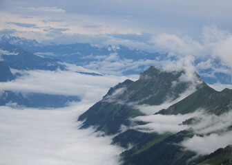 Augstmatthorn seen from Brienzer Rothorn. Mountain near Interlaken. Fog creeping around.