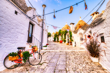 Famous Trulli Houses during a Sunny Day with Bright Blue Sky in Alberobello, Puglia