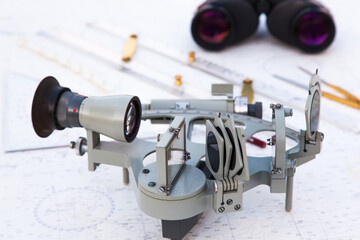 Navigation tools are on the navigation map. Sextant, plotter, divider, ruler and binoculars.