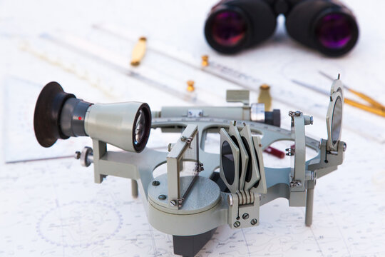 Navigation tools are on the navigation map. Sextant, plotter, divider, ruler and binoculars.