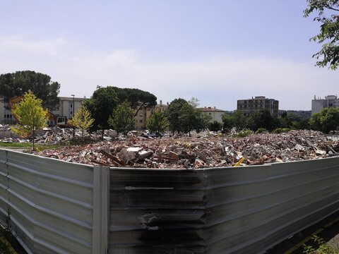 Demolition Of A Neighborhood To Renovate, Overview Of The Work In Progress, Surrounded By Metal Barriers