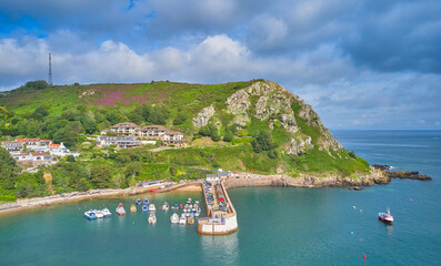 Aerial Drone image of Bonne Nuit bay in the sunshine at high tide. Jersey, Channel Islands