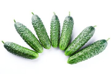 Set of fresh whole cucumbers isolated on a white background, clipping path. Garden cucumber wallpaper backdrop design