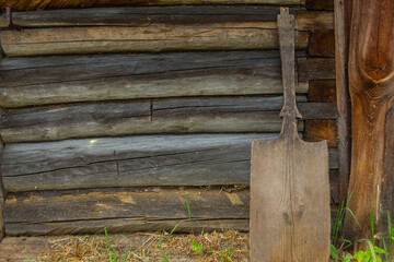 Traditional wooden bread shovel on brown background