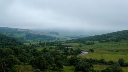 Obraz premium The River Brora in Strath Brora in summer on a misty day