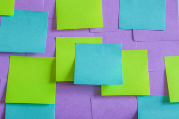 Collection of different colored sheets of note papers post it notes. Different stickers.