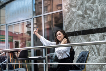 fashion woman posing near cafe, summer time