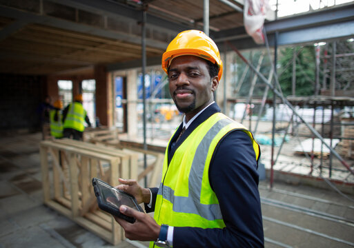 Portrait Confident Male Architect At Construction Site