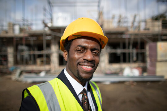 Portrait confident architect at construction site