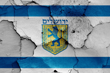 flag of Jerusalem, Israel painted on cracked wall
