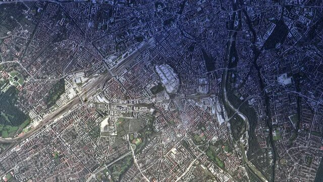 Sunrise animation flying over city satellite aerial view of Munich, Germany, Europe, Oktoberfest travel destination. Based on images furnished by Nasa