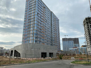 Fototapeta na wymiar New buildings new buildings. Modern development of a big city with high-rise and dense settlement