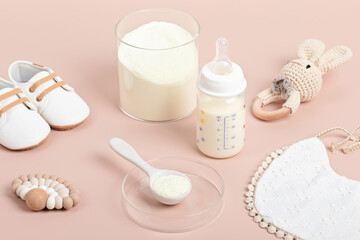 Fototapeta na wymiar Preparation of formula for baby feeding. Baby health care, organic mixture of dry milk concept.