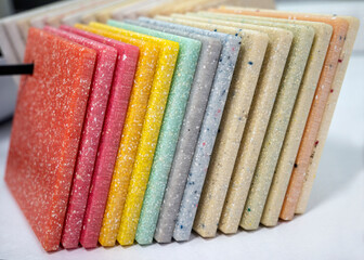 Sample of artificial acrylic stone for kitchen countertops and other furniture. Stone texture for modern interior design