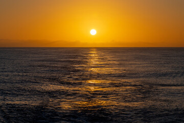 Obraz premium Beautiful seascape - waves and sky with clouds with beautiful lighting. Golden hour. Sunset at sea.