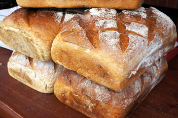 Wheat bread on wooden table.