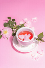 Tea from rose hips flowers, vitamin drink, hard light, dark shadow