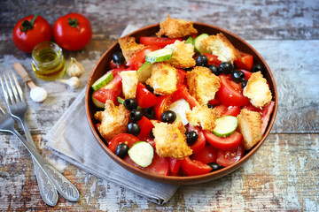 Panzanella salad with bread, olives and tomatoes.