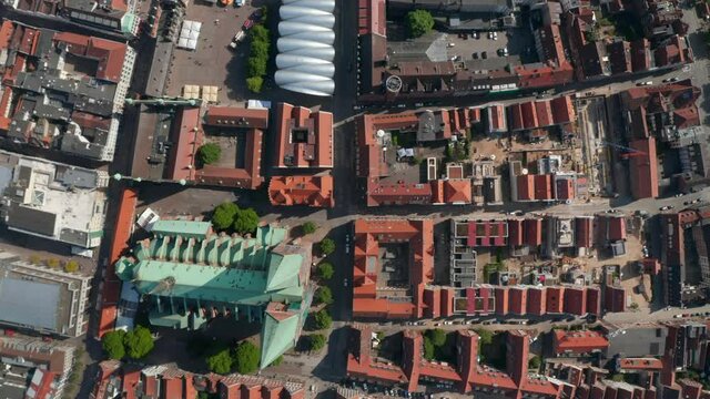 Aerial birds eye overhead top down panning view of historic town centre with St. Marys Church. Luebeck, Schleswig-Holstein, Germany