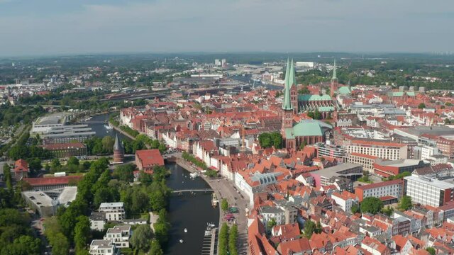 Aerial shot of old town centre. View of Holstentor, Marienkirche and several other churches. Luebeck, Schleswig-Holstein, Germany