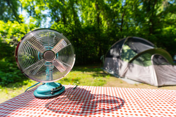 Mini outdoor fan for picnics or camping - obrazy, fototapety, plakaty
