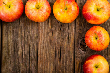 apple fruits frame background, old weathered wood table